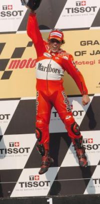 Loris Capirossi jumps for joy at Motegi