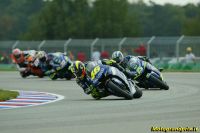 The 2005 MotoGP field streams through